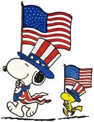 snoopy and woodstuck parading in 4th of July parade