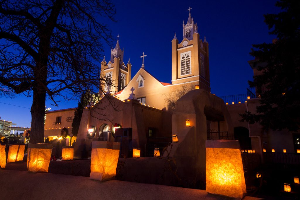 church decorated with luminarias