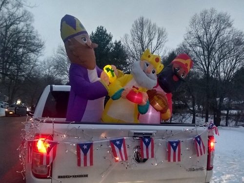 3-magi inflatables on the back of a truck in the parade