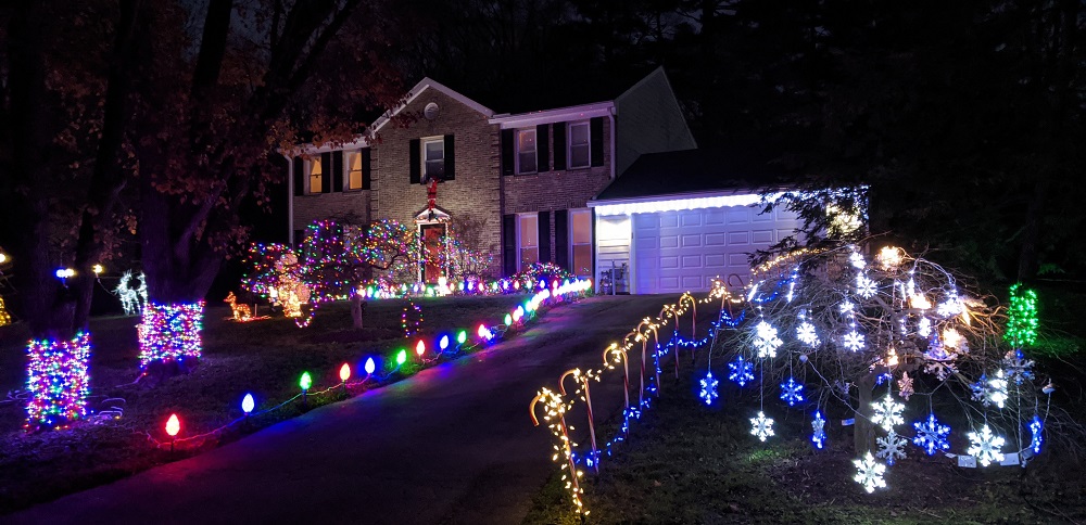 front yard decorate with lots of lights for the Christmas holidays