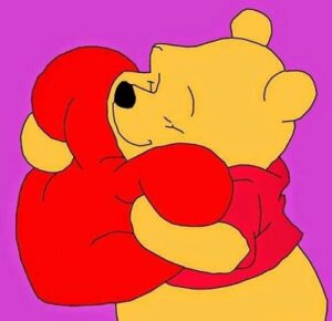 pooh bear huggin a red heart
